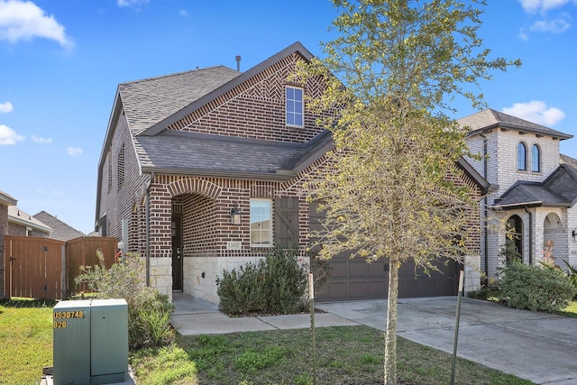 view of front of property with a garage