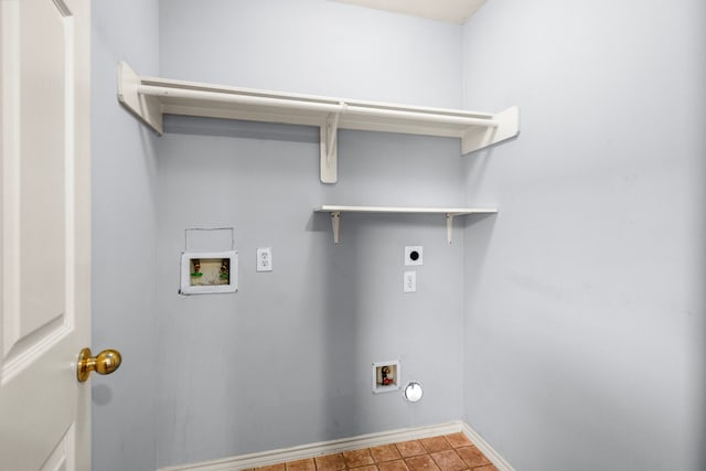 clothes washing area with electric dryer hookup and hookup for a washing machine