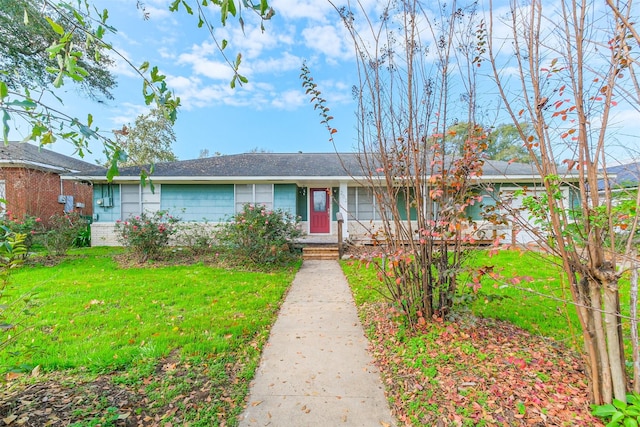 ranch-style home with a front yard