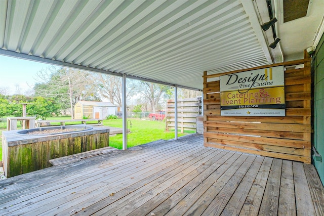 deck with a hot tub