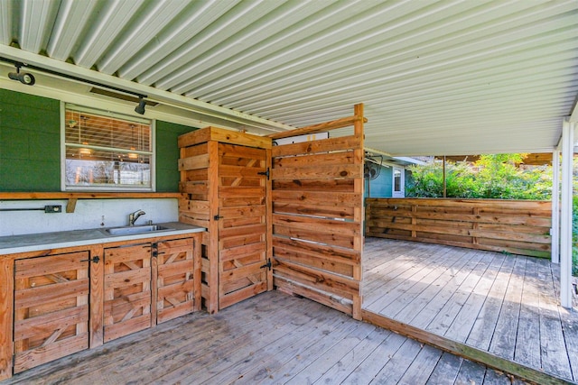 wooden terrace with sink and exterior kitchen