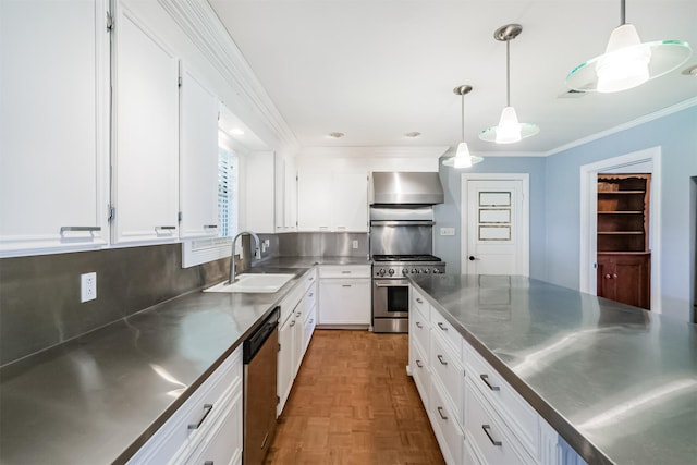 kitchen featuring white cabinets, stainless steel counters, pendant lighting, and stainless steel appliances