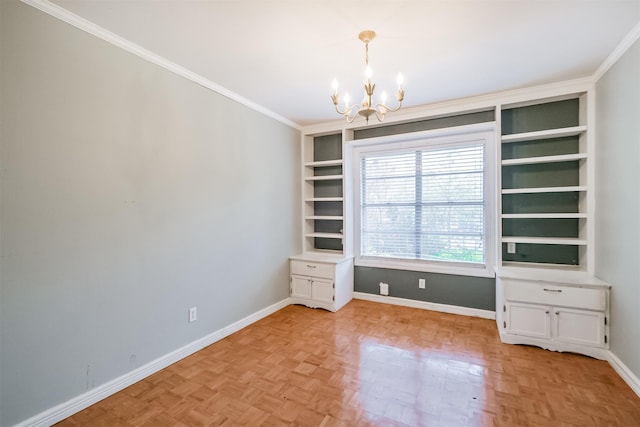 interior space with built in shelves, light parquet flooring, ornamental molding, and a notable chandelier