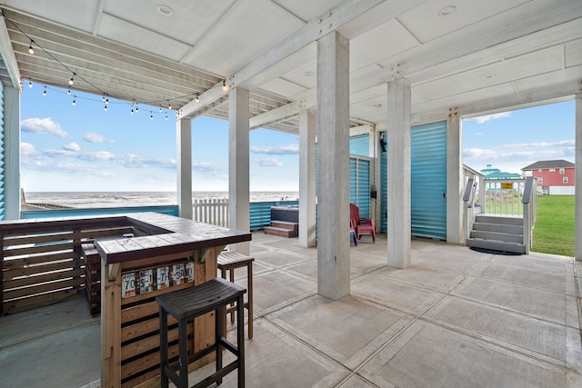 view of patio / terrace with a water view