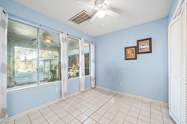 empty room with a textured ceiling