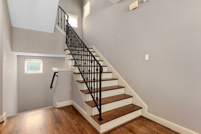 stairs with wood-type flooring