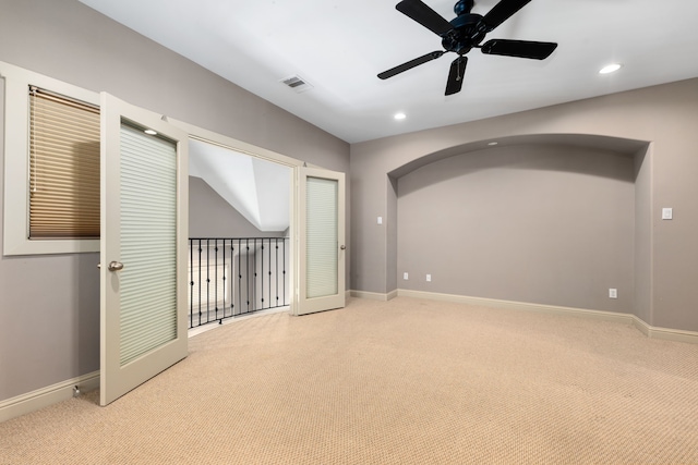 carpeted empty room with ceiling fan