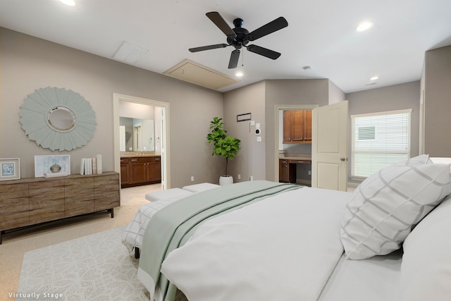 bedroom with ensuite bath and ceiling fan