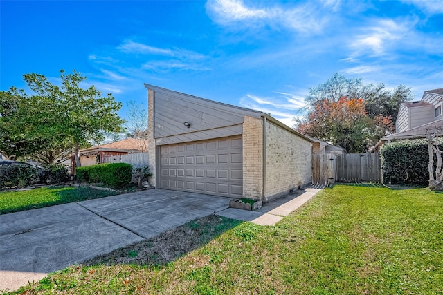 view of property exterior featuring a garage and a lawn