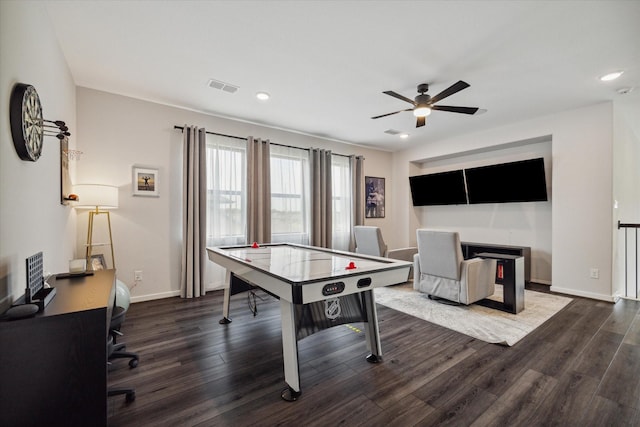 rec room featuring recessed lighting, wood finished floors, visible vents, and baseboards