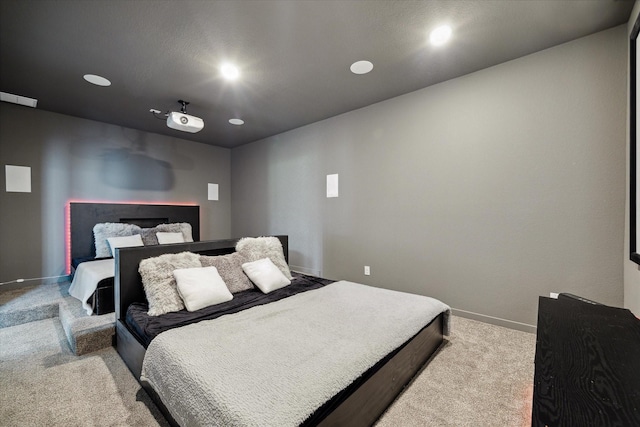 bedroom with recessed lighting, baseboards, and carpet flooring