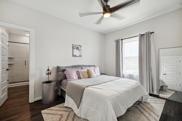 bedroom featuring baseboards, ceiling fan, and wood finished floors