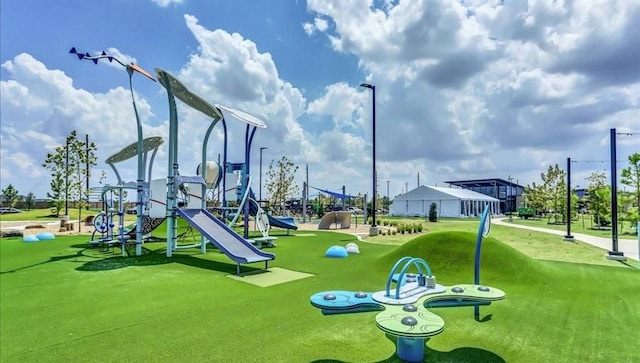 view of play area with a yard