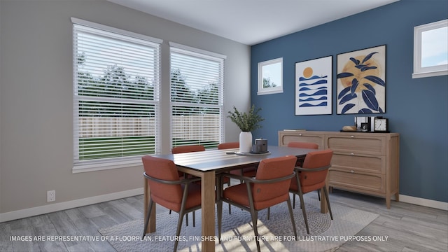 dining room featuring light hardwood / wood-style flooring