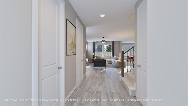 hall with light hardwood / wood-style floors