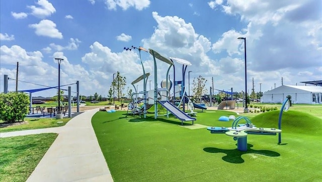 view of play area featuring a lawn