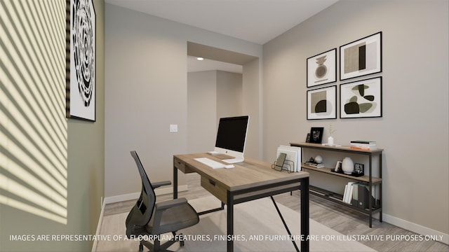 office with light hardwood / wood-style flooring