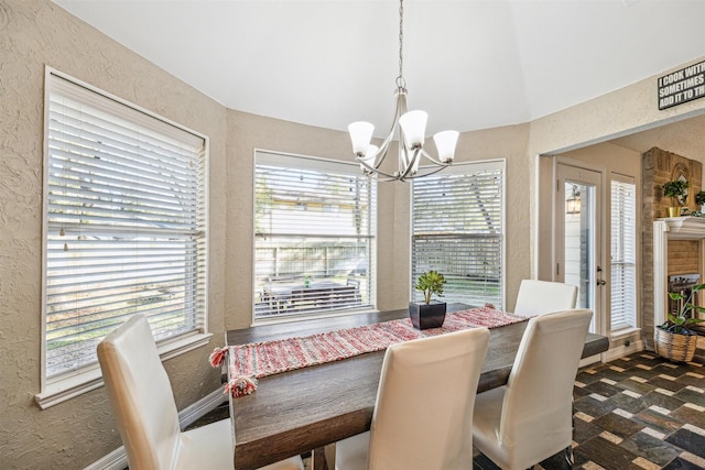 dining space with a chandelier