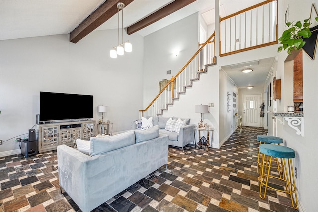 living room featuring beam ceiling and high vaulted ceiling