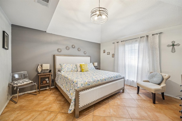 bedroom with tile patterned floors