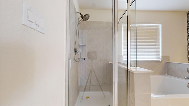 bathroom with independent shower and bath