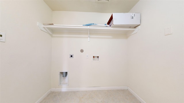 laundry room featuring electric dryer hookup and washer hookup