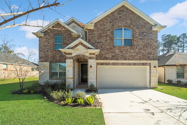 view of front of property with a front lawn and a garage