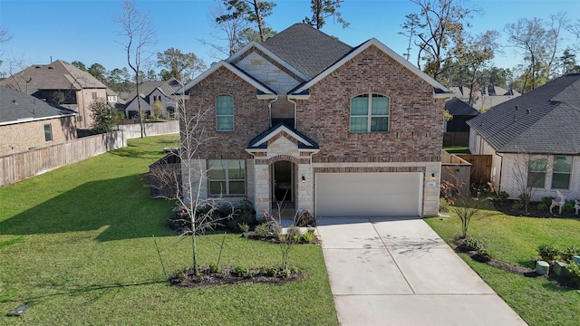 view of front of house with a front lawn and a garage