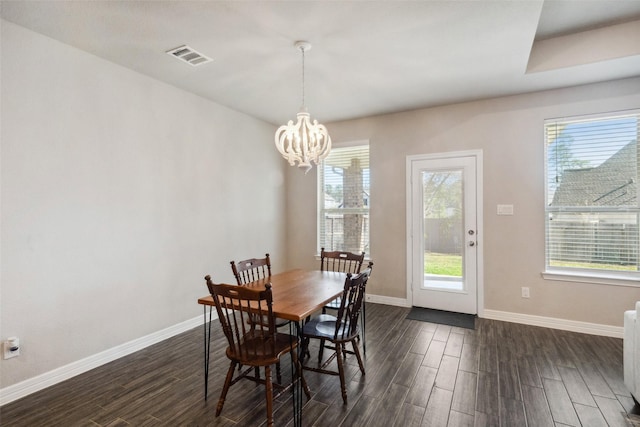 dining room with a chandelier