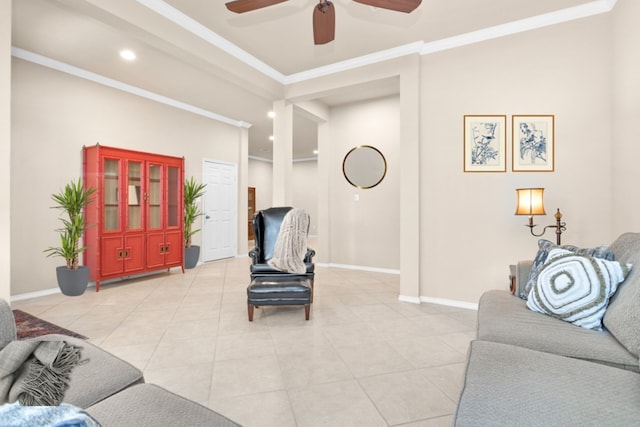 tiled living room with crown molding and ceiling fan