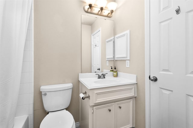 full bathroom featuring shower / tub combo, vanity, and toilet