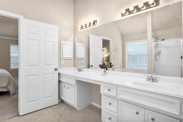 bathroom with tile patterned flooring, vanity, an enclosed shower, and crown molding