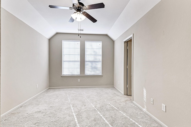 interior space with ceiling fan and lofted ceiling