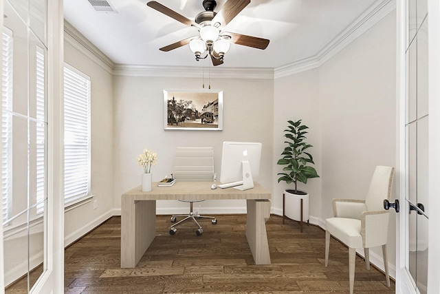 office area with dark hardwood / wood-style flooring, a wealth of natural light, and crown molding