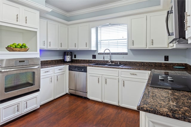 kitchen featuring sink, white cabinets, and appliances with stainless steel finishes