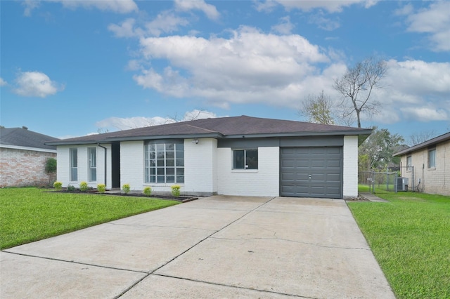 single story home with a front yard, a garage, and cooling unit