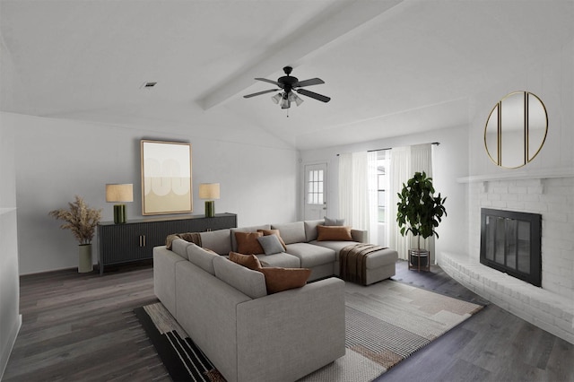 living room with a fireplace, vaulted ceiling with beams, ceiling fan, and dark wood-type flooring