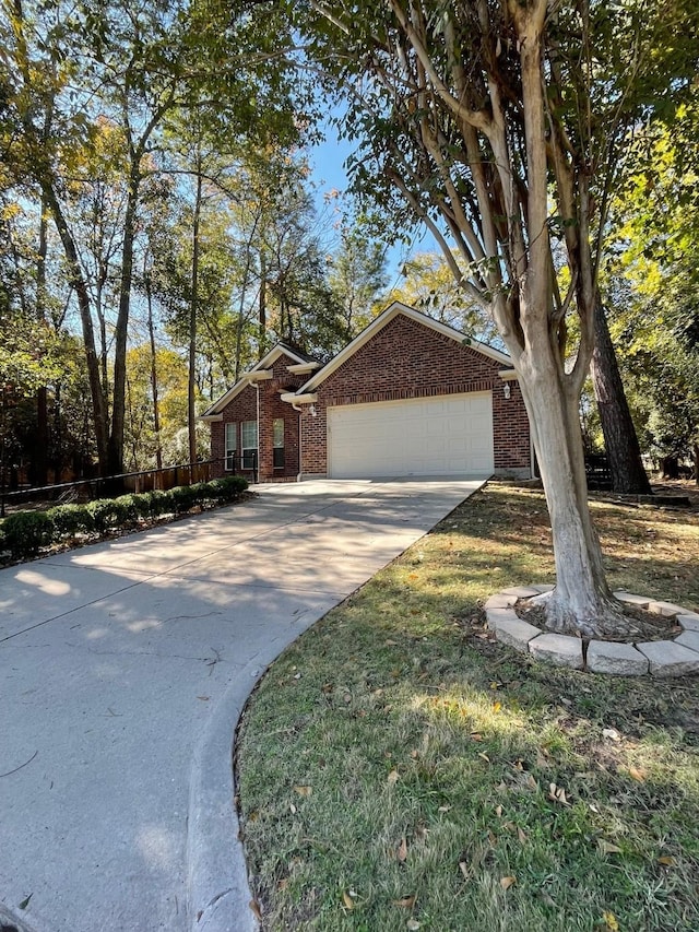 single story home with a garage