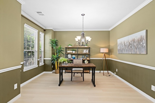 office with ornamental molding, light hardwood / wood-style floors, and a notable chandelier