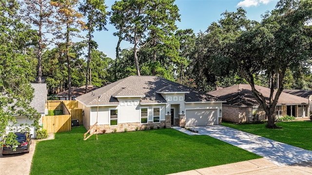 view of front of house with central AC unit, a garage, and a front lawn