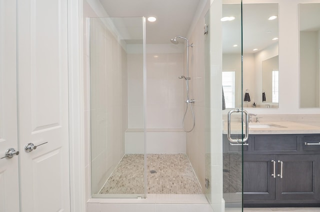 bathroom with vanity, tile patterned floors, and an enclosed shower