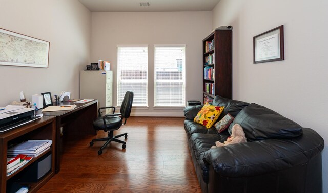 office with hardwood / wood-style floors and a wealth of natural light