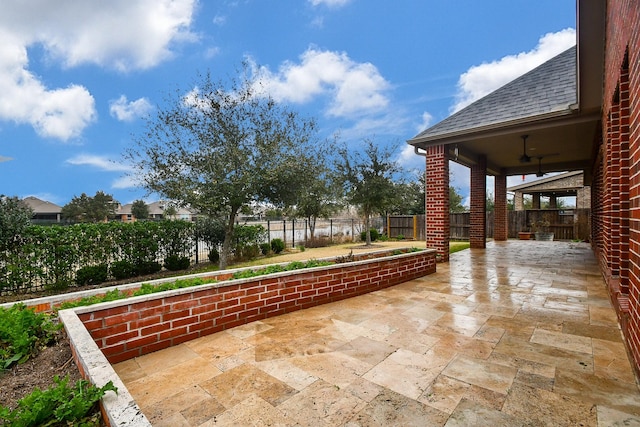 view of patio / terrace with ceiling fan