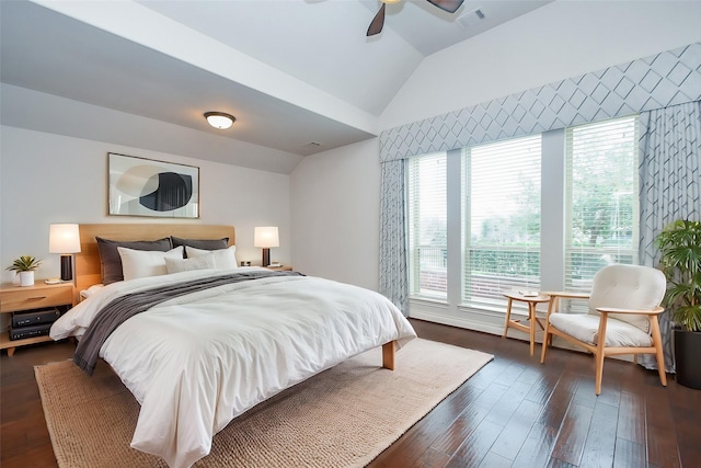 bedroom with visible vents, ceiling fan, vaulted ceiling, and dark wood-style floors