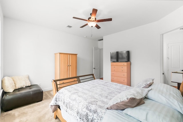 bedroom with ceiling fan and carpet