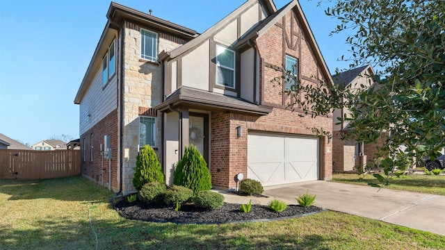 view of front of property featuring a garage and a front yard