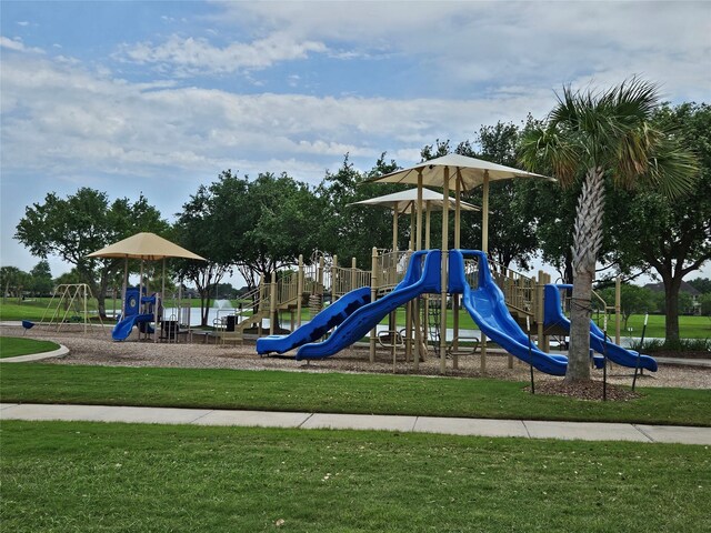 view of playground featuring a lawn