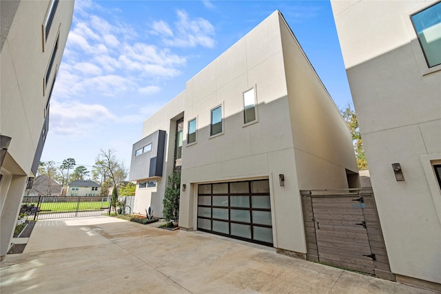 view of side of property featuring a garage