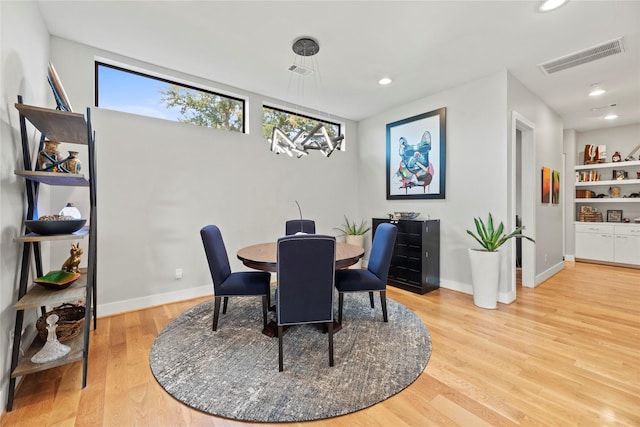 dining area with light wood-type flooring