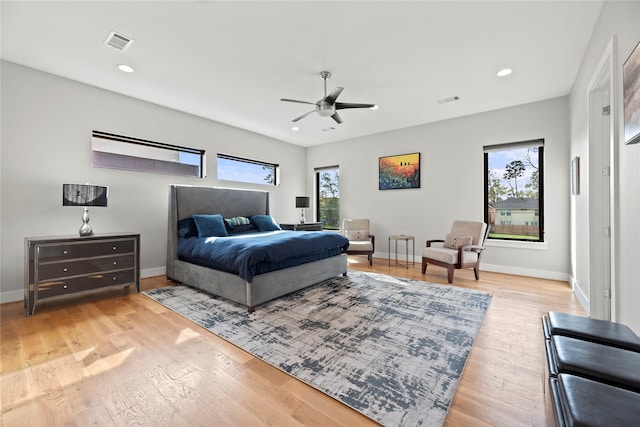 bedroom featuring ceiling fan and hardwood / wood-style flooring